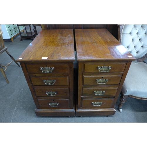 179 - A pair of Victorian walnut pedestal chests