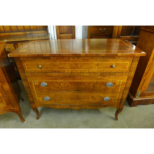 181 - A pair of French style inlaid walnut commodes