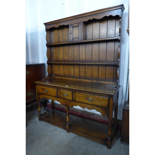 184 - A Titchmarsh & Goodwin oak dresser