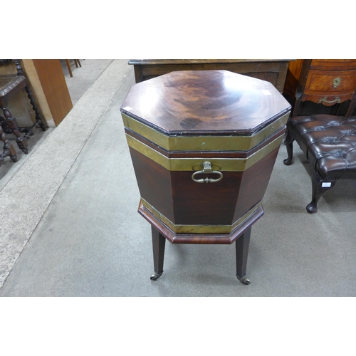 203 - A George III mahogany and brass banded octagonal wine cooler