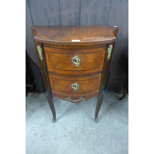 207 - A Louis XV style mahogany and brass mounted serpentine petit commode