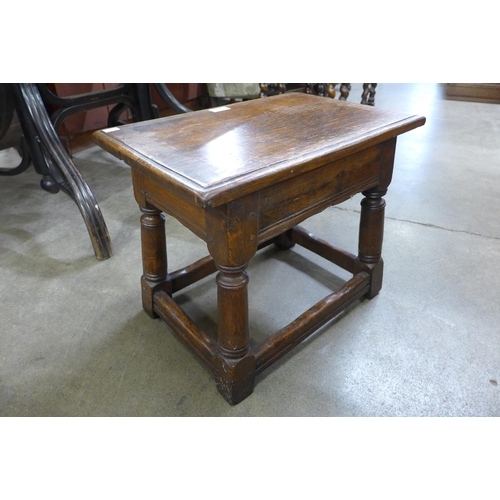 211 - A George III style oak stool