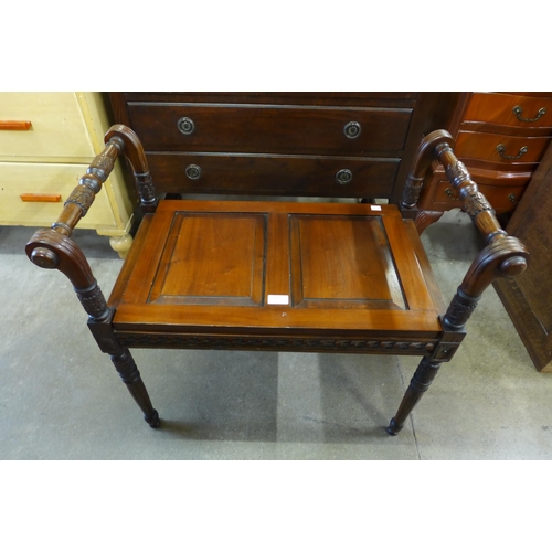 218 - A Regency style mahogany window seat