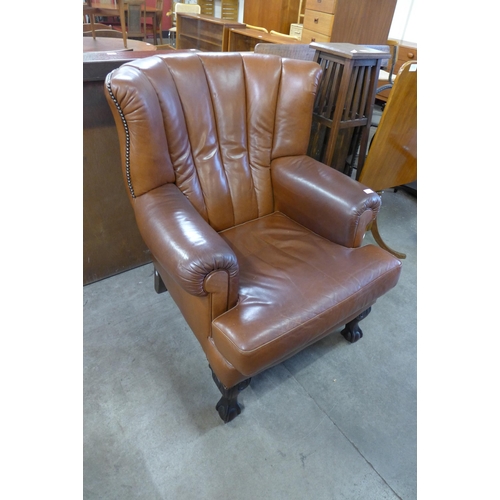 220 - A Tetrad Blake brown leather wingback armchair