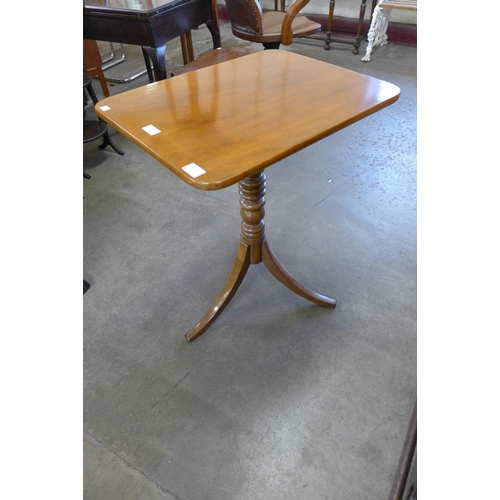 221 - A Victorian mahogany rectangular tilt-top tripod table