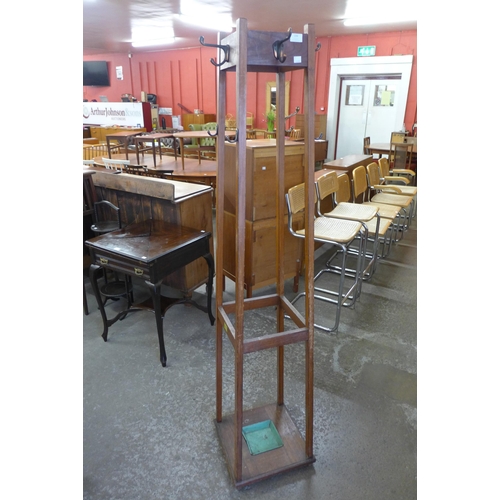 226 - An Edward VII oak coat stand