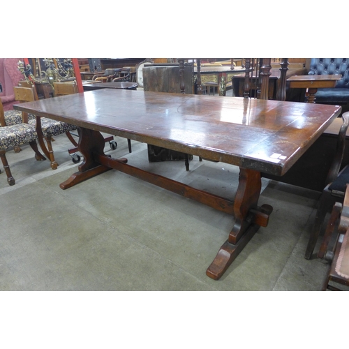 262 - An 18th Century style oak refectory table, 75cms h, 217cms l, 95cms w