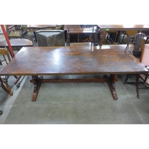 262 - An 18th Century style oak refectory table, 75cms h, 217cms l, 95cms w