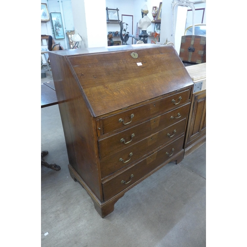 287 - A George III oak bureau