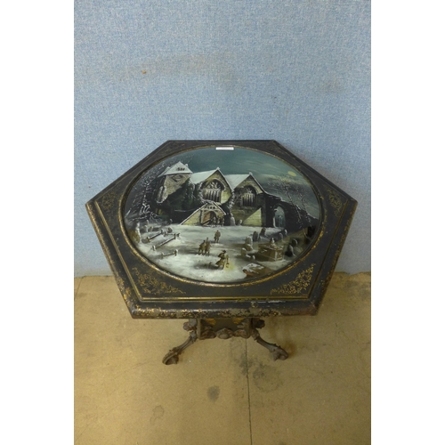 322 - A Victorian wrought steel and gilt inlaid purdonium, with winter church scene painted glass top