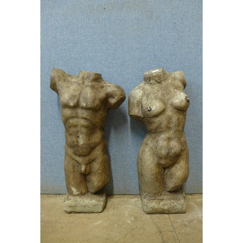 327 - A pair of concrete torso garden figures, 50cms h