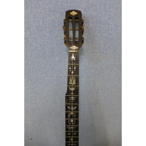 349 - A Victorian mother of pearl inlaid banjo in case