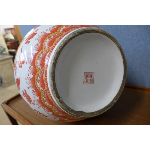 351 - A Chinese white porcelain and red Imperial dragon pattern vase