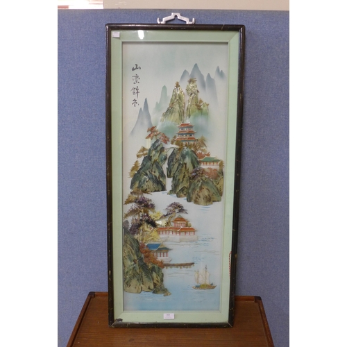 354 - A oriental shell relief plaque, framed