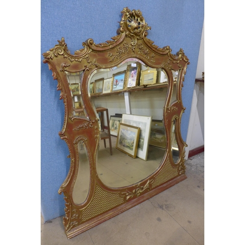 355 - A 19th Century French Louis XV style gilt framed overmantel mirror