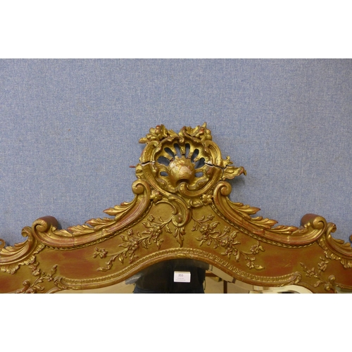 355 - A 19th Century French Louis XV style gilt framed overmantel mirror