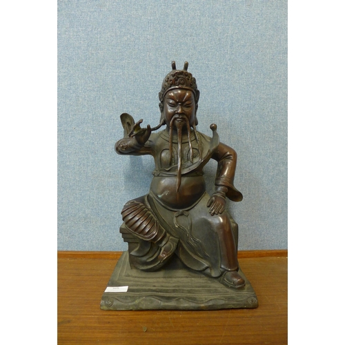 369 - A Chinese bronze figure of an Emperor