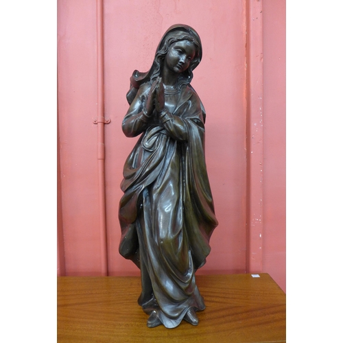 55 - A bronze figure of the Virgin Mary, 69cms h