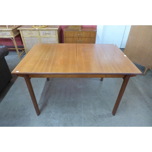 61 - A White & Newton teak extending dining table