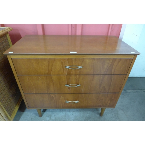 63 - A walnut chest of drawers