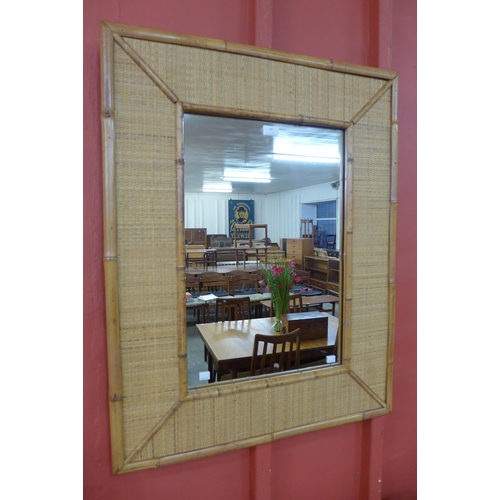 66 - A bamboo and rattan framed mirror