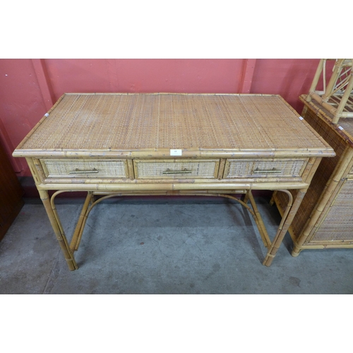 68 - A bamboo and rattan three drawer desk