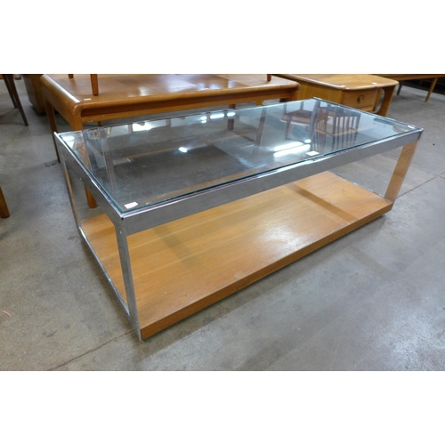 91 - A Merrow Associates chrome and glass topped coffee table, designed by Richard Young