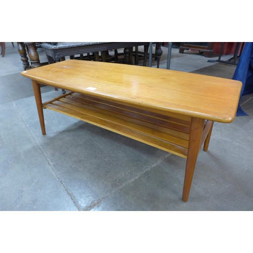 92 - A teak coffee table