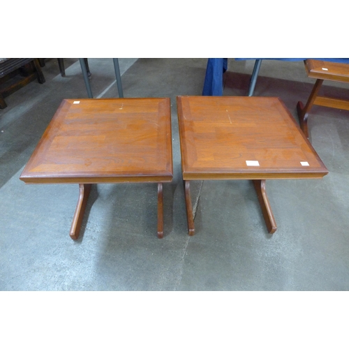 95 - A pair of teak occasional tables