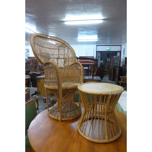 99 - A wicker peacock chair and a bamboo occasional table