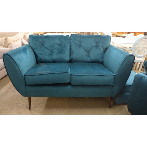 1523 - A Hoxton turquoise velvet two seater sofa on long legs