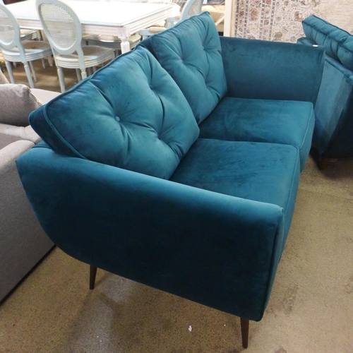 1523 - A Hoxton turquoise velvet two seater sofa on long legs