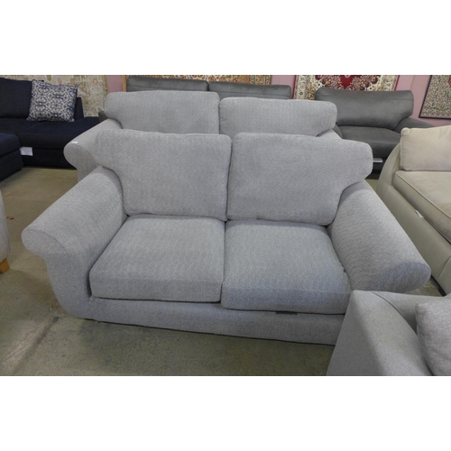 1530 - A grey teddy upholstered three and two seater sofa