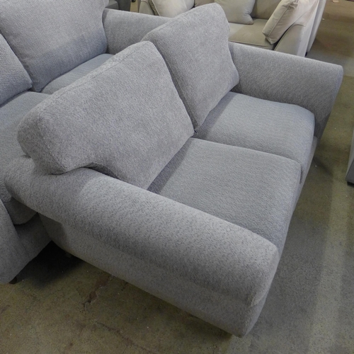 1530 - A grey teddy upholstered three and two seater sofa