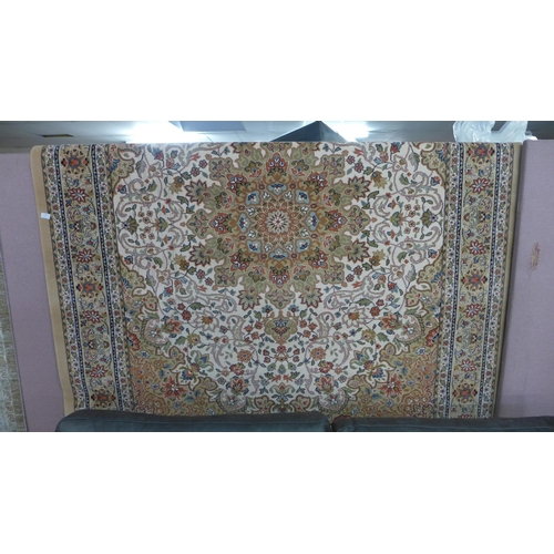 1532 - A cream ground full pile Wilton carpet with floral pattern, 300cm x 200cm