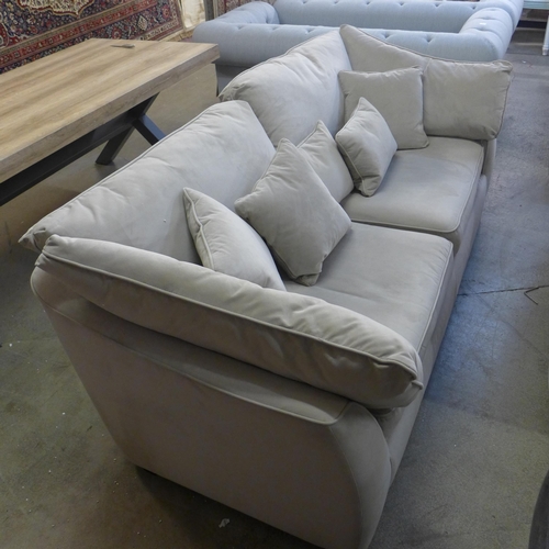 1534 - A light stone velvet three seater and a love seat