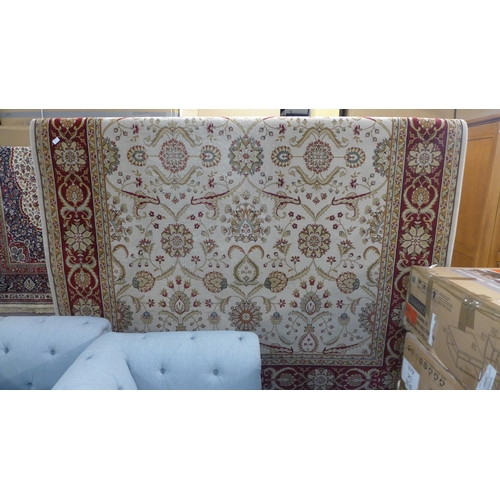 1541 - A red and cream thick pile rug