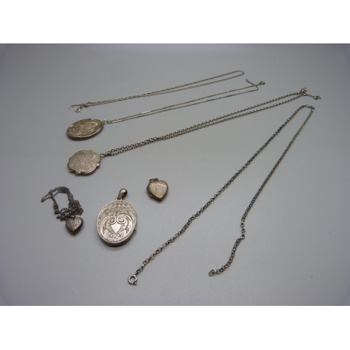 1000 - Five silver and white metal lockets and chains