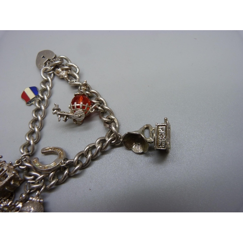 1003 - A silver charm bracelet, 45g