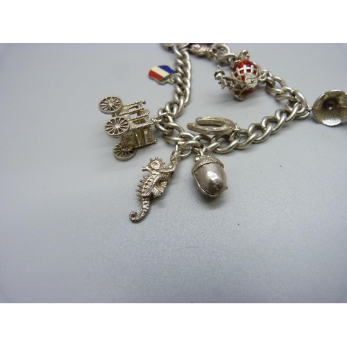 1003 - A silver charm bracelet, 45g