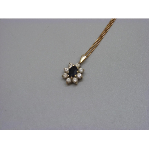 1009 - A 9ct gold, sapphire and white stone pendant and chain, 3.4g