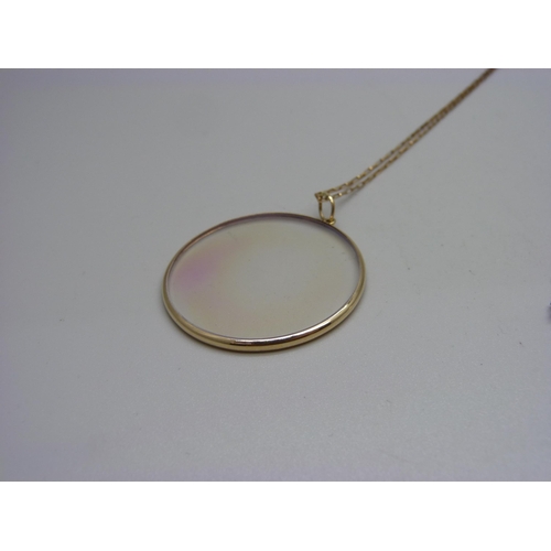 1016 - A hologram pendant with 9ct gold loop mount and 9ct gold chain, chain 1.2g