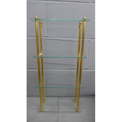 1030 - A reeded gilt shelf unit with glass shelves **PLEASE NOTE THIS LOT IS NOT ELIGIBLE FOR POSTING AND P... 