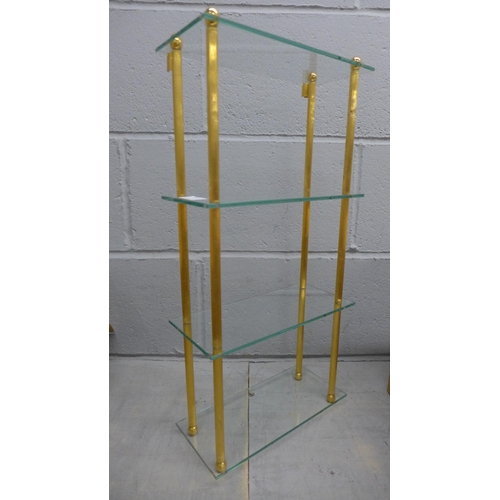 1030 - A reeded gilt shelf unit with glass shelves **PLEASE NOTE THIS LOT IS NOT ELIGIBLE FOR POSTING AND P... 