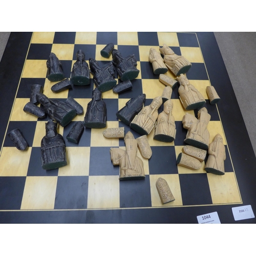 1044 - A chess board and pieces **PLEASE NOTE THIS LOT IS NOT ELIGIBLE FOR POSTING AND PACKING**