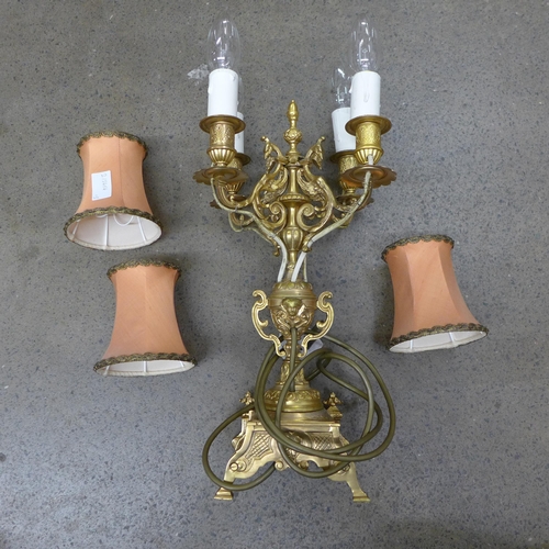 1048 - An Ormolu four arm table lamp with deep apricot shades **PLEASE NOTE THIS LOT IS NOT ELIGIBLE FOR PO... 