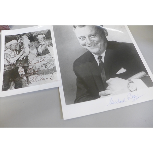 610 - Signed photographs of Mickey Rooney, Red Skelton, Charlton Heston, etc., (6)