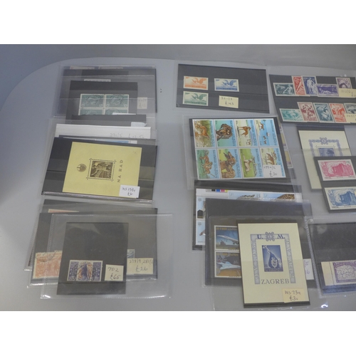 619 - Stamps; small collection of better individual stamps and sets on stock cards with a catalogue value ... 