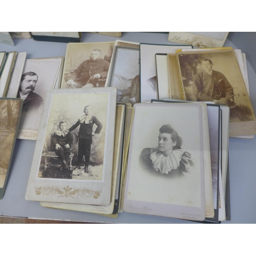 623 - A collection of eighty cabinet cards