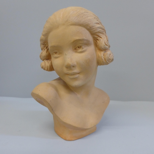 626 - An Art Nouveau clay bust of a lady, early 20th Century, signed P. Dumont, 19cm